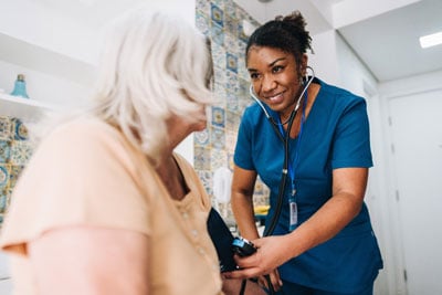 Healthcare worker with a patient