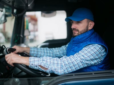 Man driving a truck